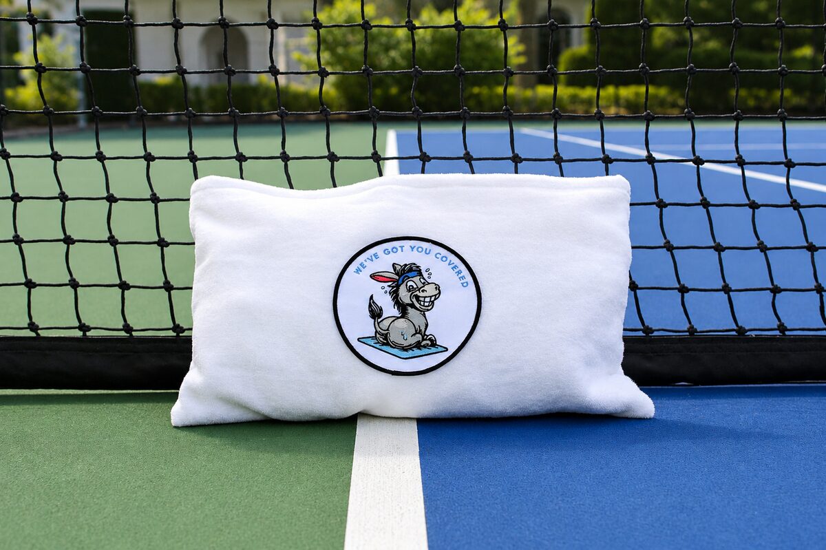 Sweaty Ass Towel folded at the tennis net