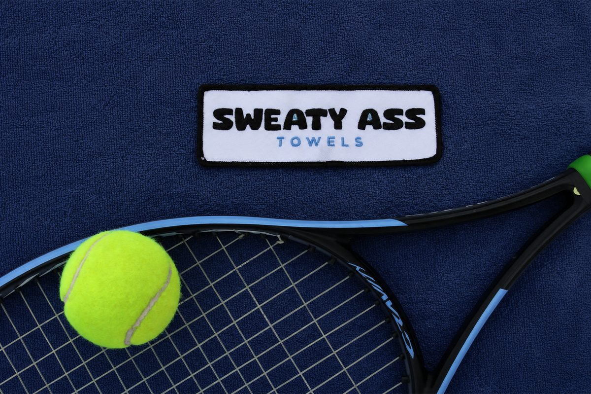 Sweaty Ass Towel in navy with a racket and ball